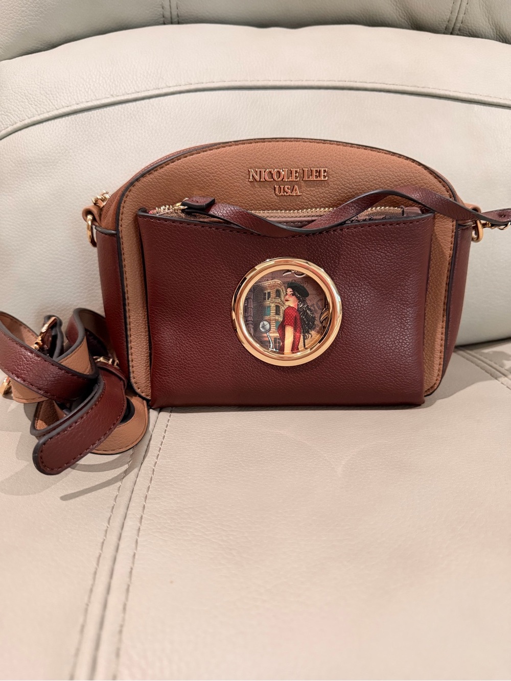 Nicole Lee Brown & Tan Two-Tone Crossbody Bag with Gold Medallion